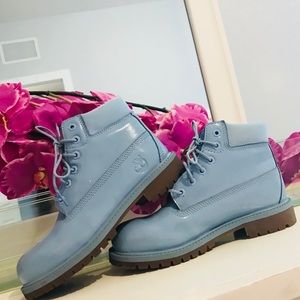 Bright pastel blue boots